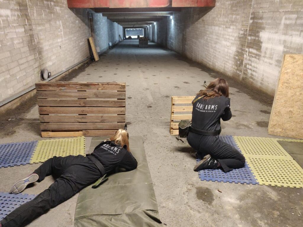 Two students learning to work together on the L2 Advanced Theatrical Firearms Course